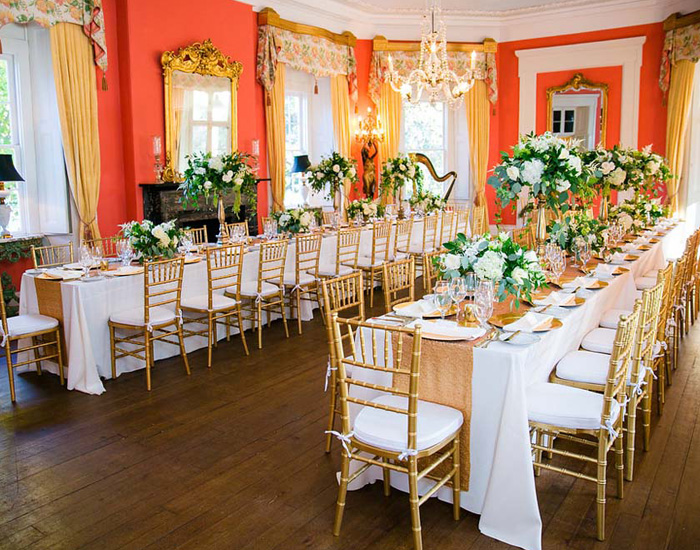 Two Long Tables with Gold Center Layouts & Flower Arrangements